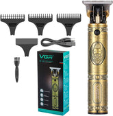 Gold and black hair trimmer with attachments and packaging on a white background